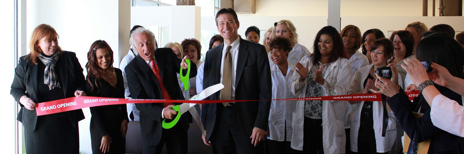 Mario cutting ribbon at Salon Corps