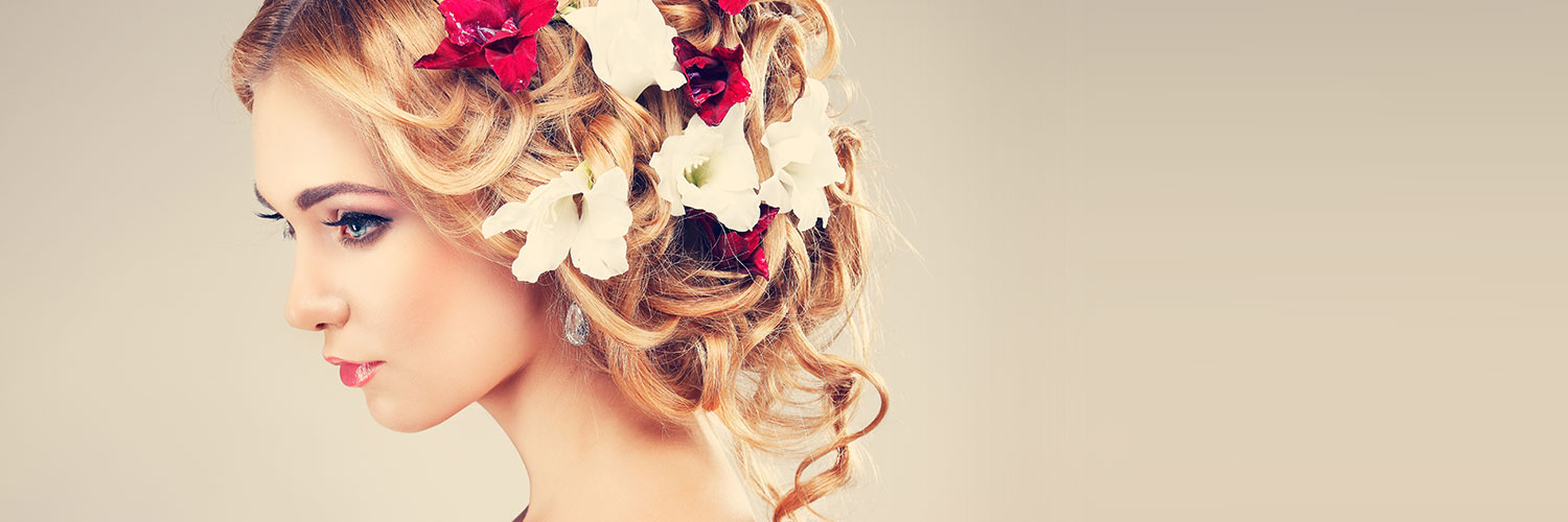 Beauty model with flowers in her hair