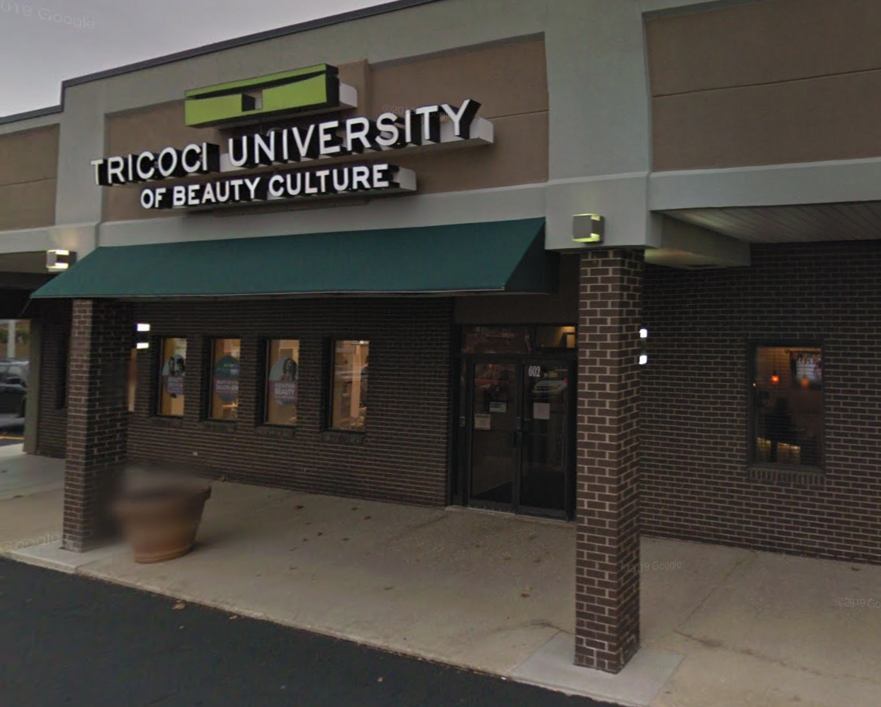 Peoria campus of Tricoci University of Beauty Culture providing hair cutting services