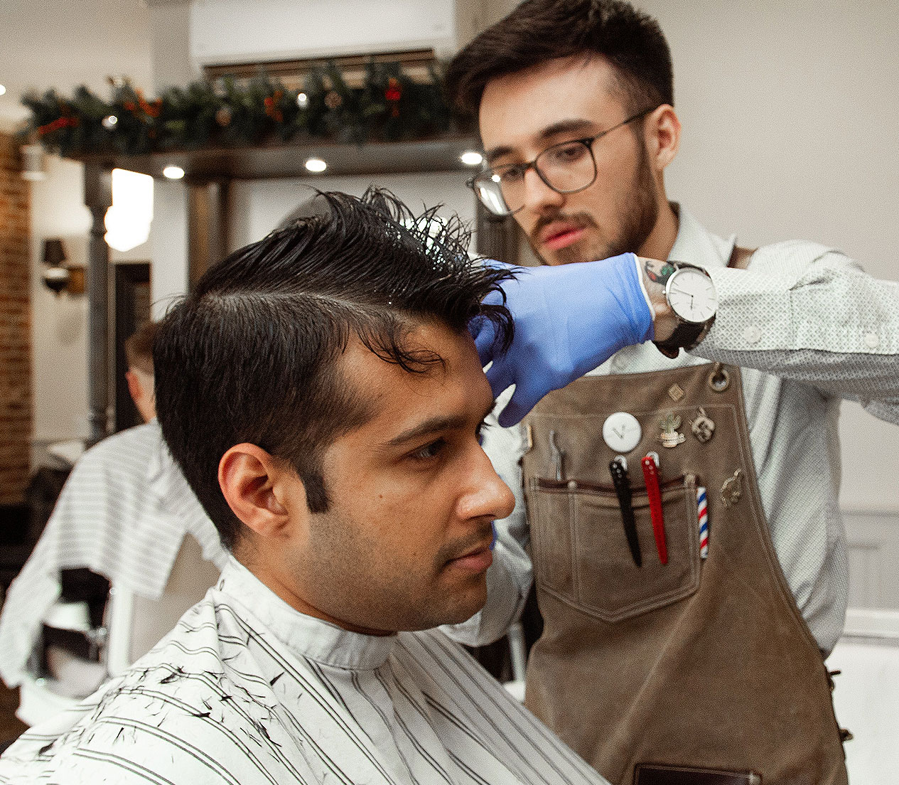 Tricoci University Student Cutting Customer's Hair