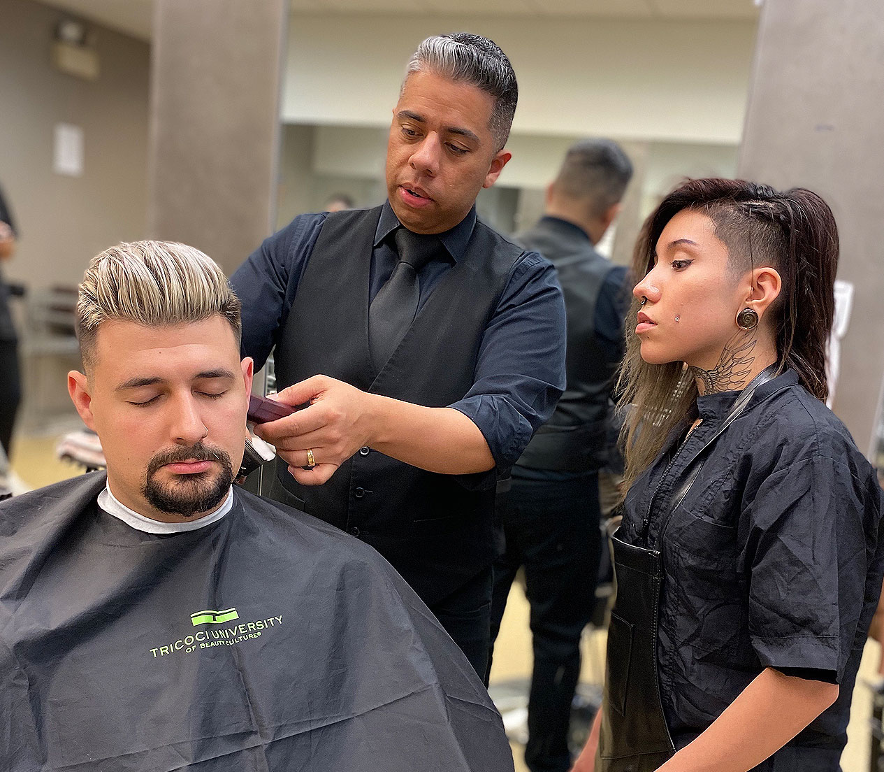 Tricoci University Student Cutting Customer's Hair