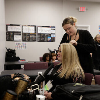 Tricoci student practicing cosmetology at Bloomington location